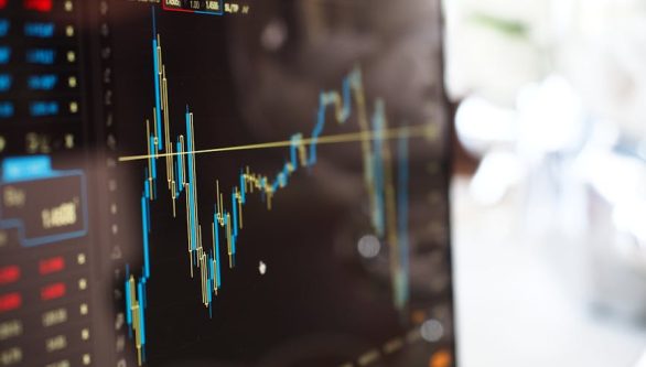 pexels-photo-159888-159888 Detailed view of financial trading graphs on a monitor, illustrating stock market trends.